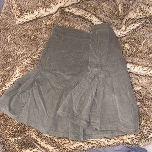 Green pleated skirt
